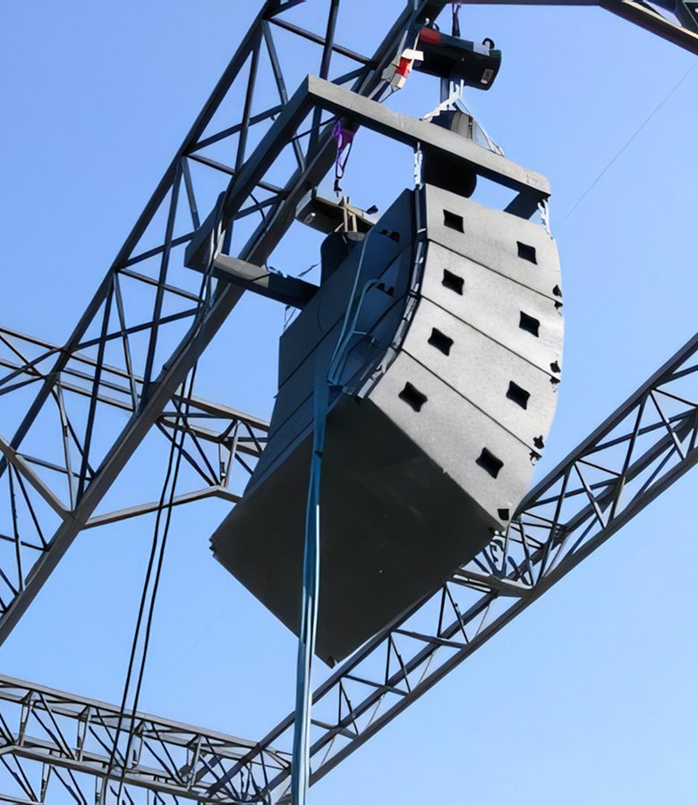 Line array speakers rigged on a truss by ASL Masterpiece